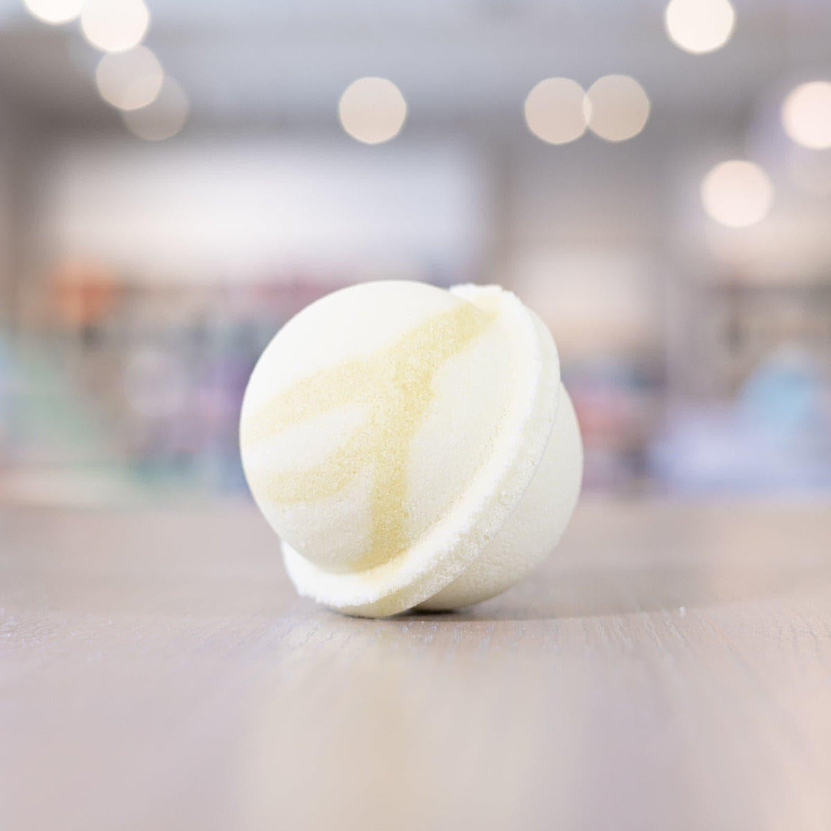 White Good Morning Sunshine Bath Bomb with a light yellow design